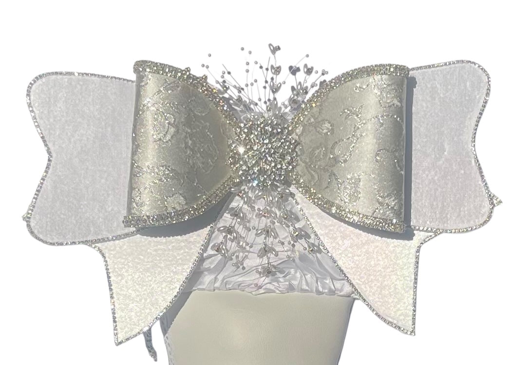 The Wedding Bridal Bougie Add couture elegance to your special day Personalization is offered with this stunning attachment handcrafted by costume designer Cindy Russell